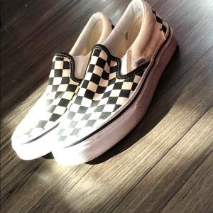 Checkered Black & White Vans slip on